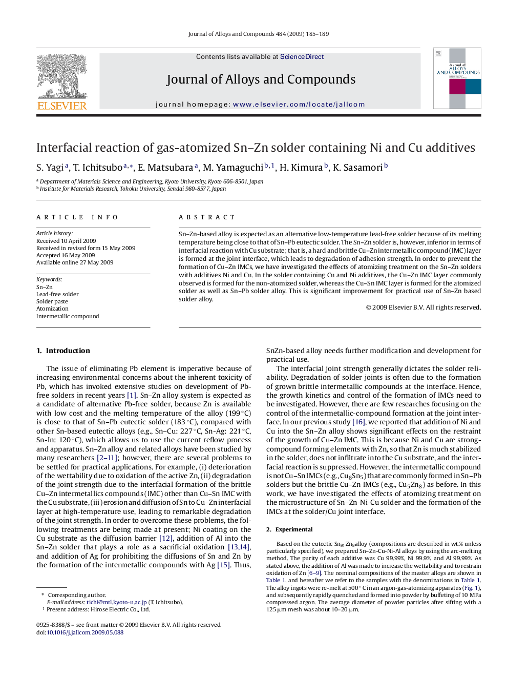 Interfacial reaction of gas-atomized Sn–Zn solder containing Ni and Cu additives