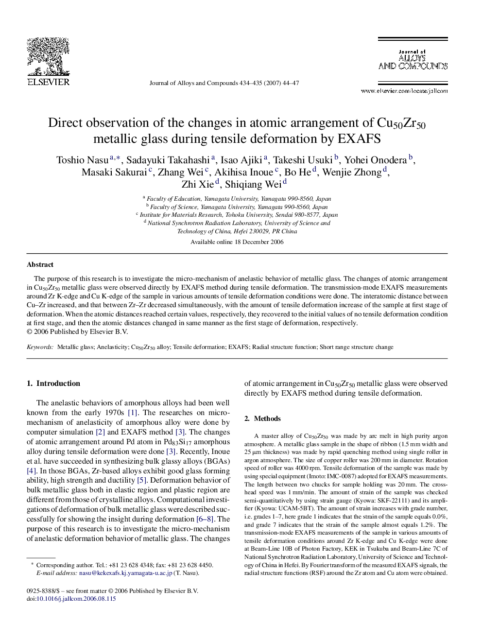 Direct observation of the changes in atomic arrangement of Cu50Zr50 metallic glass during tensile deformation by EXAFS