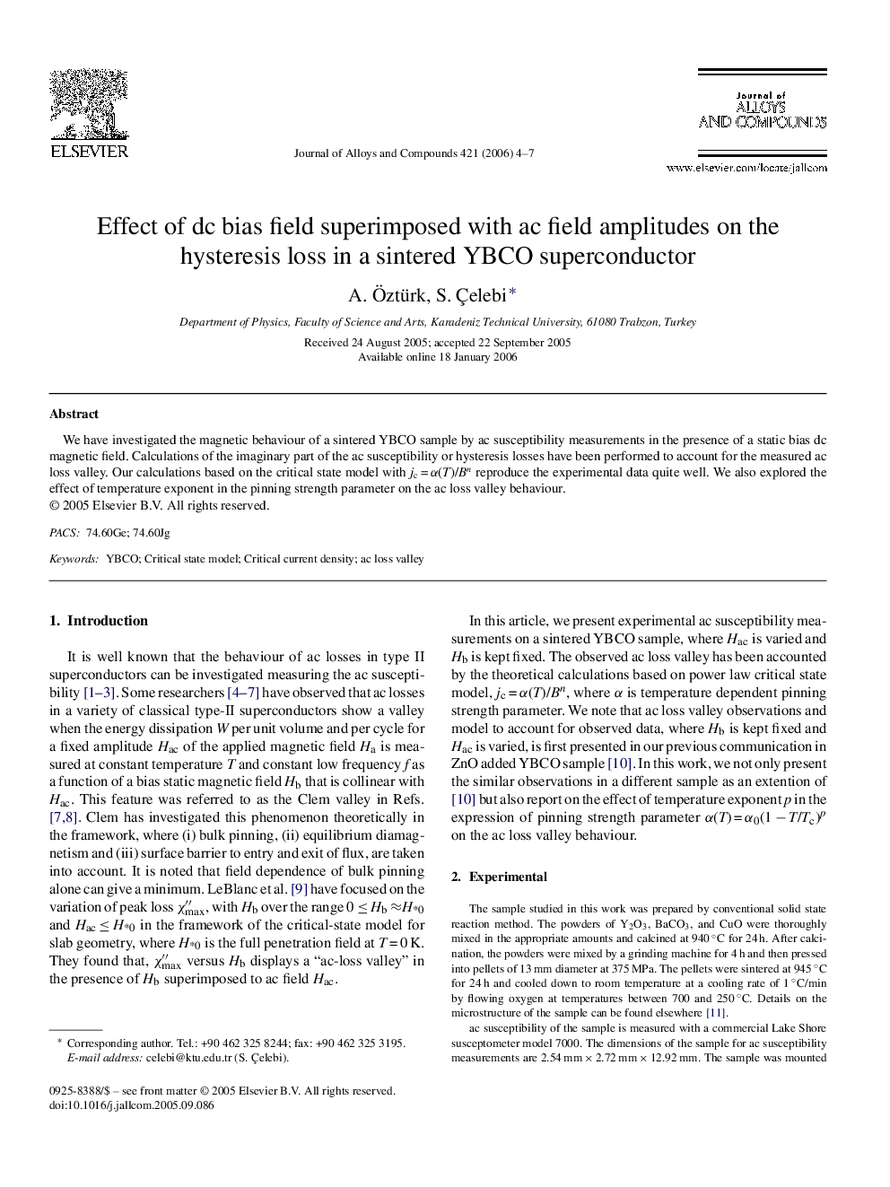 Effect of dc bias field superimposed with ac field amplitudes on the hysteresis loss in a sintered YBCO superconductor