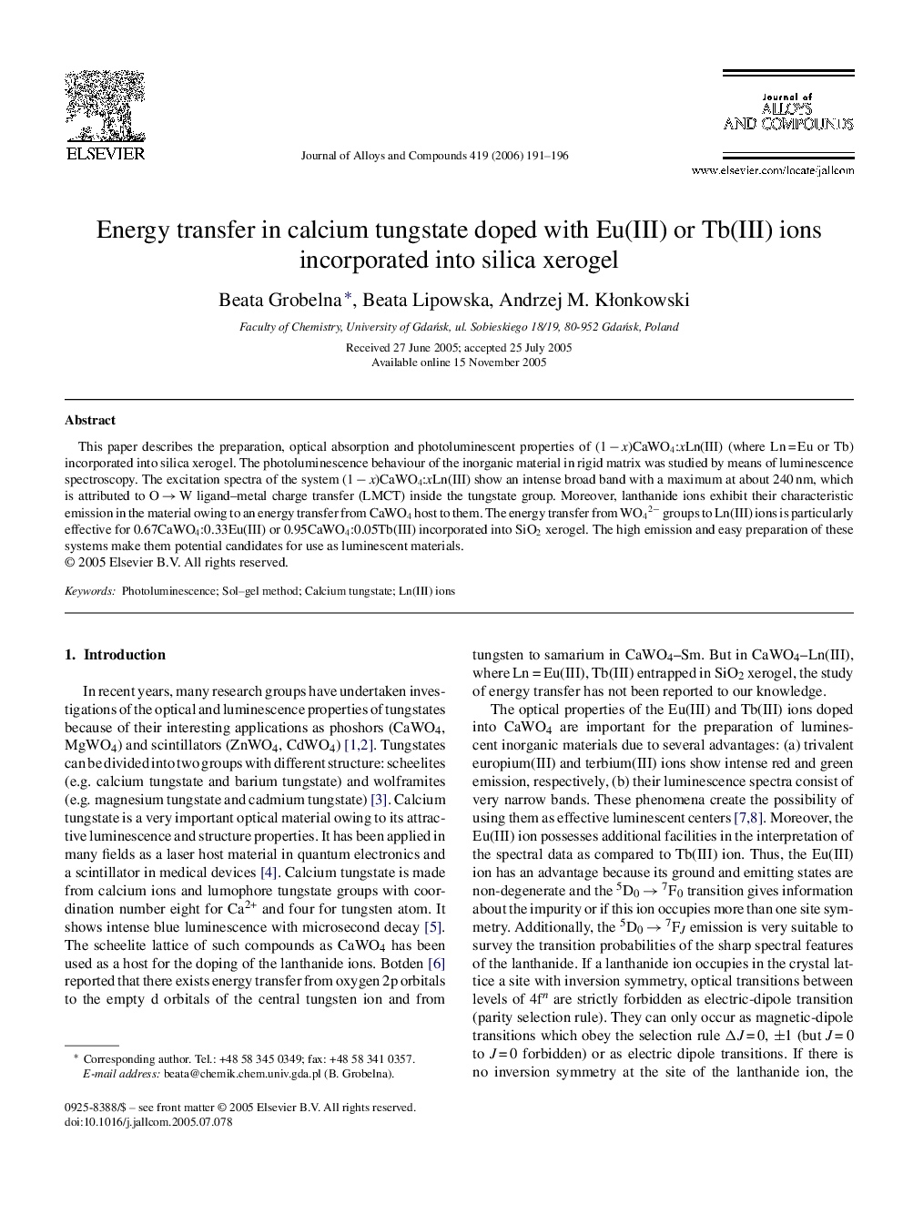 Energy transfer in calcium tungstate doped with Eu(III) or Tb(III) ions incorporated into silica xerogel