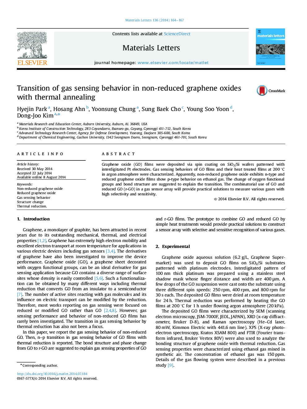Transition of gas sensing behavior in non-reduced graphene oxides with thermal annealing
