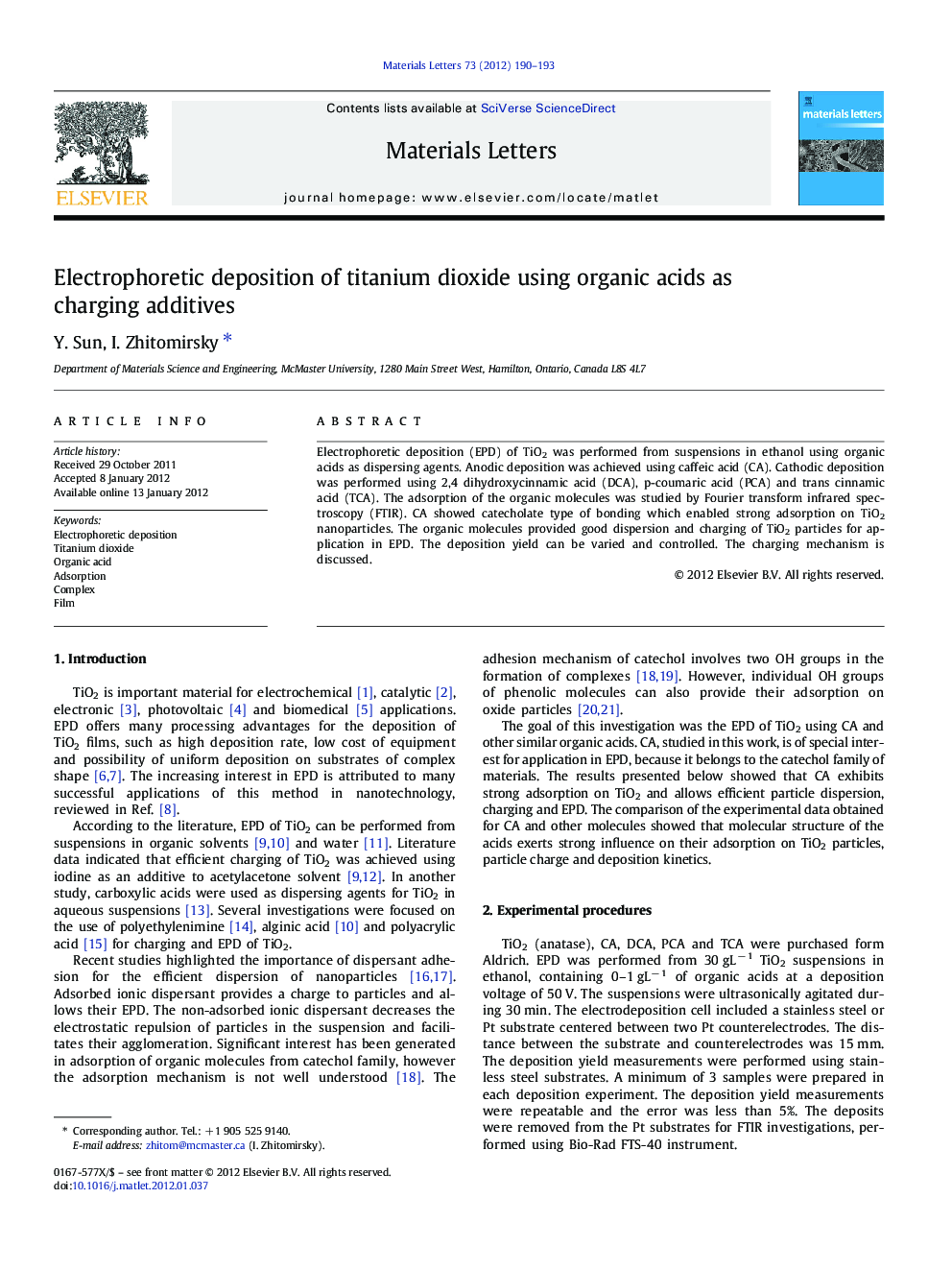 Electrophoretic deposition of titanium dioxide using organic acids as charging additives