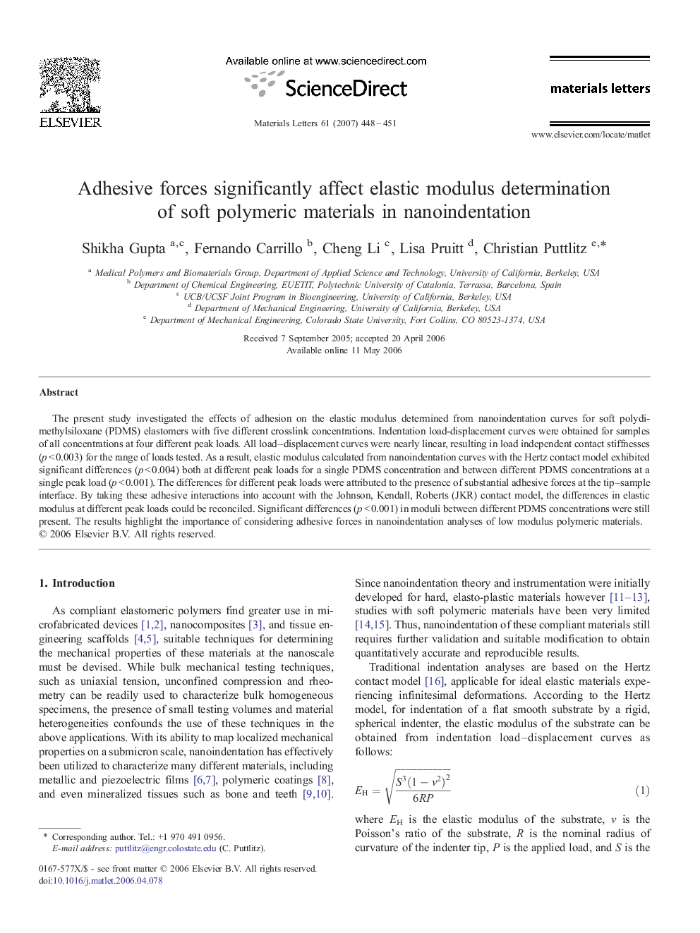 Adhesive forces significantly affect elastic modulus determination of soft polymeric materials in nanoindentation