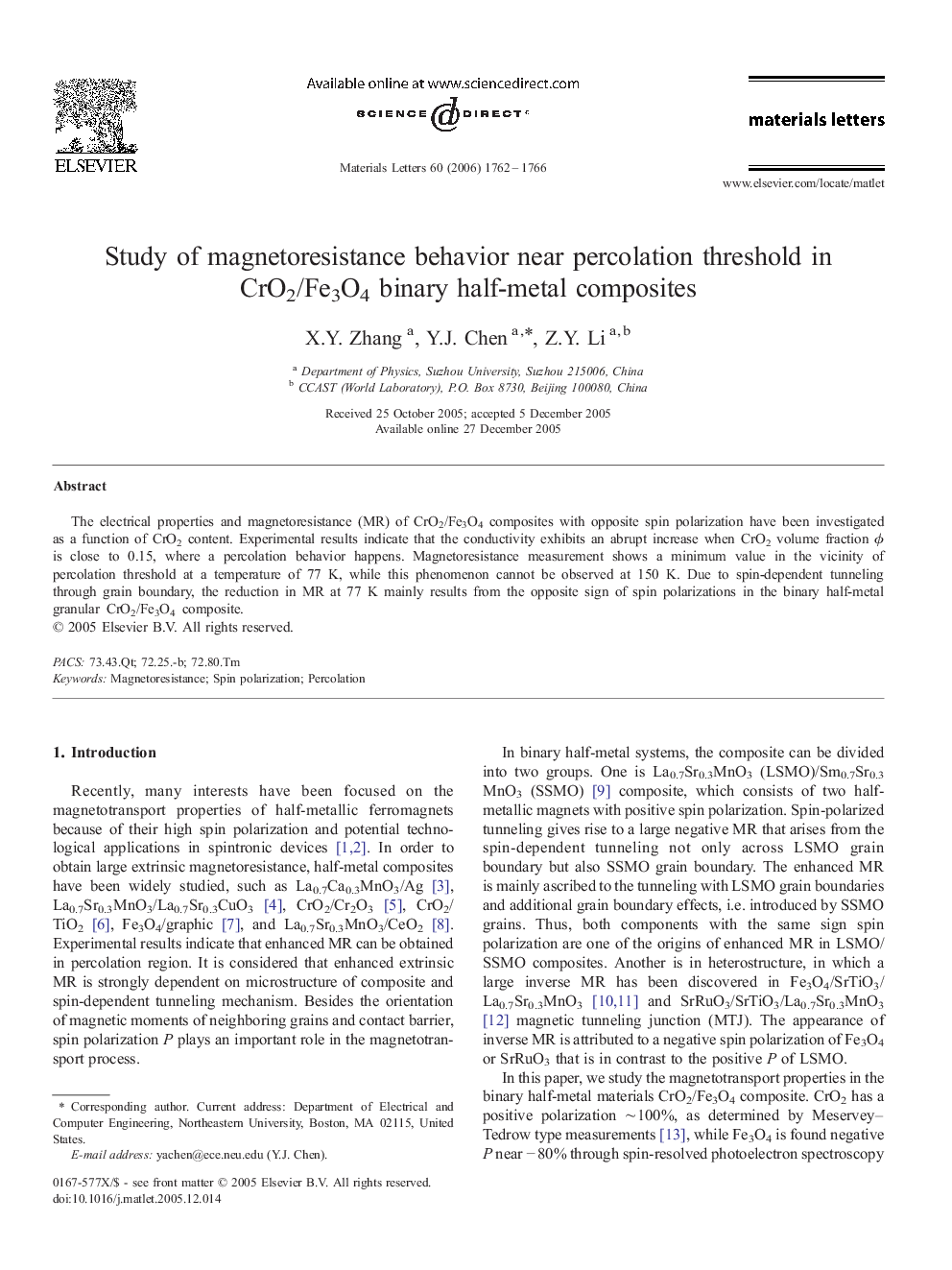 Study of magnetoresistance behavior near percolation threshold in CrO2/Fe3O4 binary half-metal composites