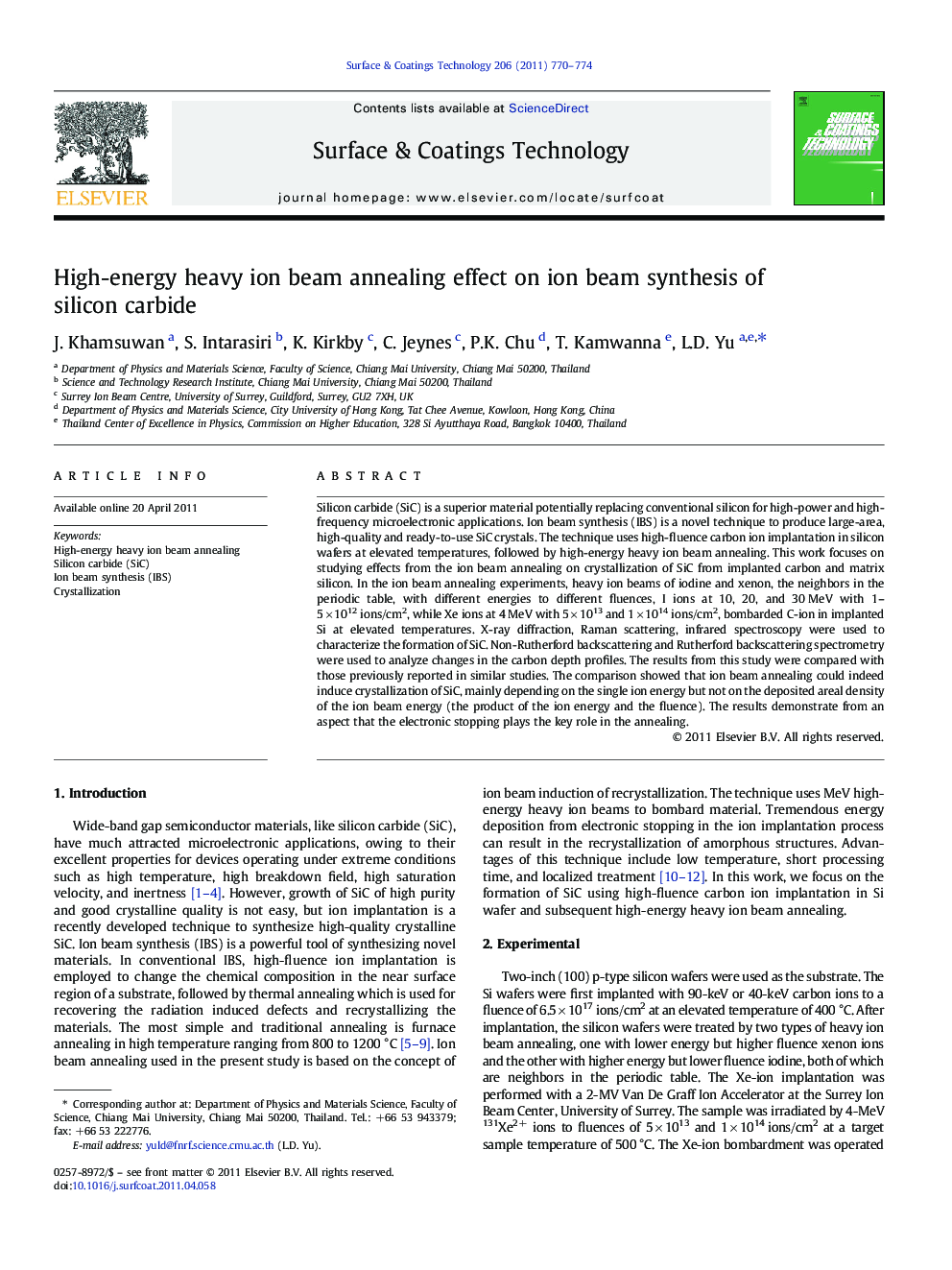 High-energy heavy ion beam annealing effect on ion beam synthesis of silicon carbide