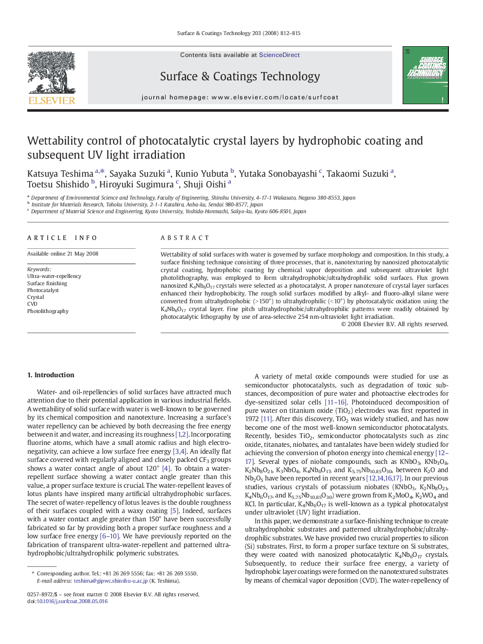 Wettability control of photocatalytic crystal layers by hydrophobic coating and subsequent UV light irradiation