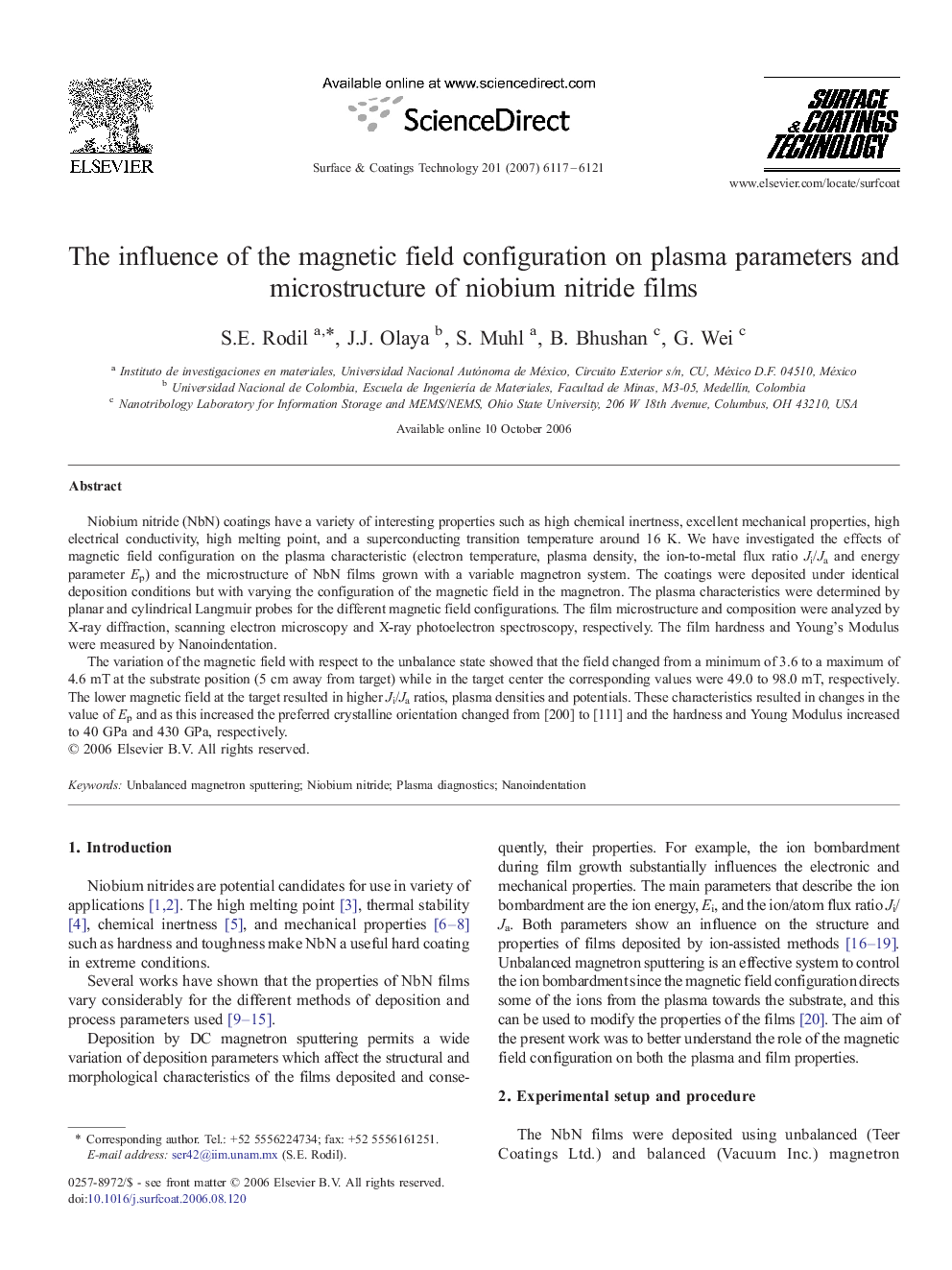 The influence of the magnetic field configuration on plasma parameters and microstructure of niobium nitride films