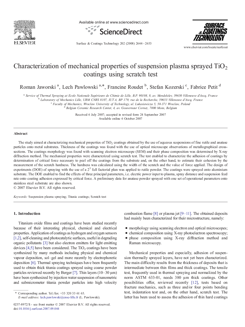 Characterization of mechanical properties of suspension plasma sprayed TiO2 coatings using scratch test