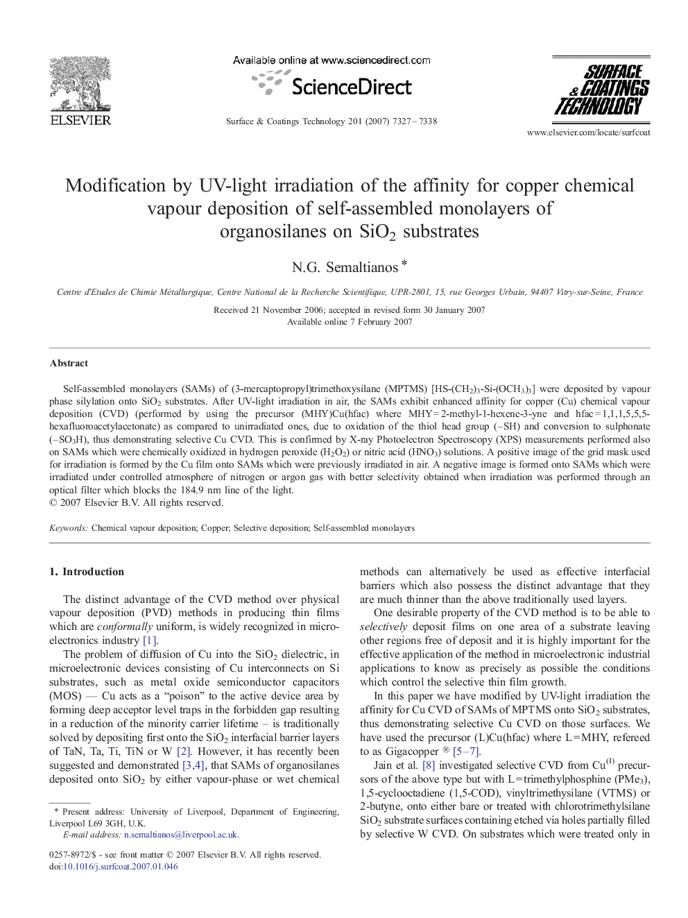 Modification by UV-light irradiation of the affinity for copper chemical vapour deposition of self-assembled monolayers of organosilanes on SiO2 substrates