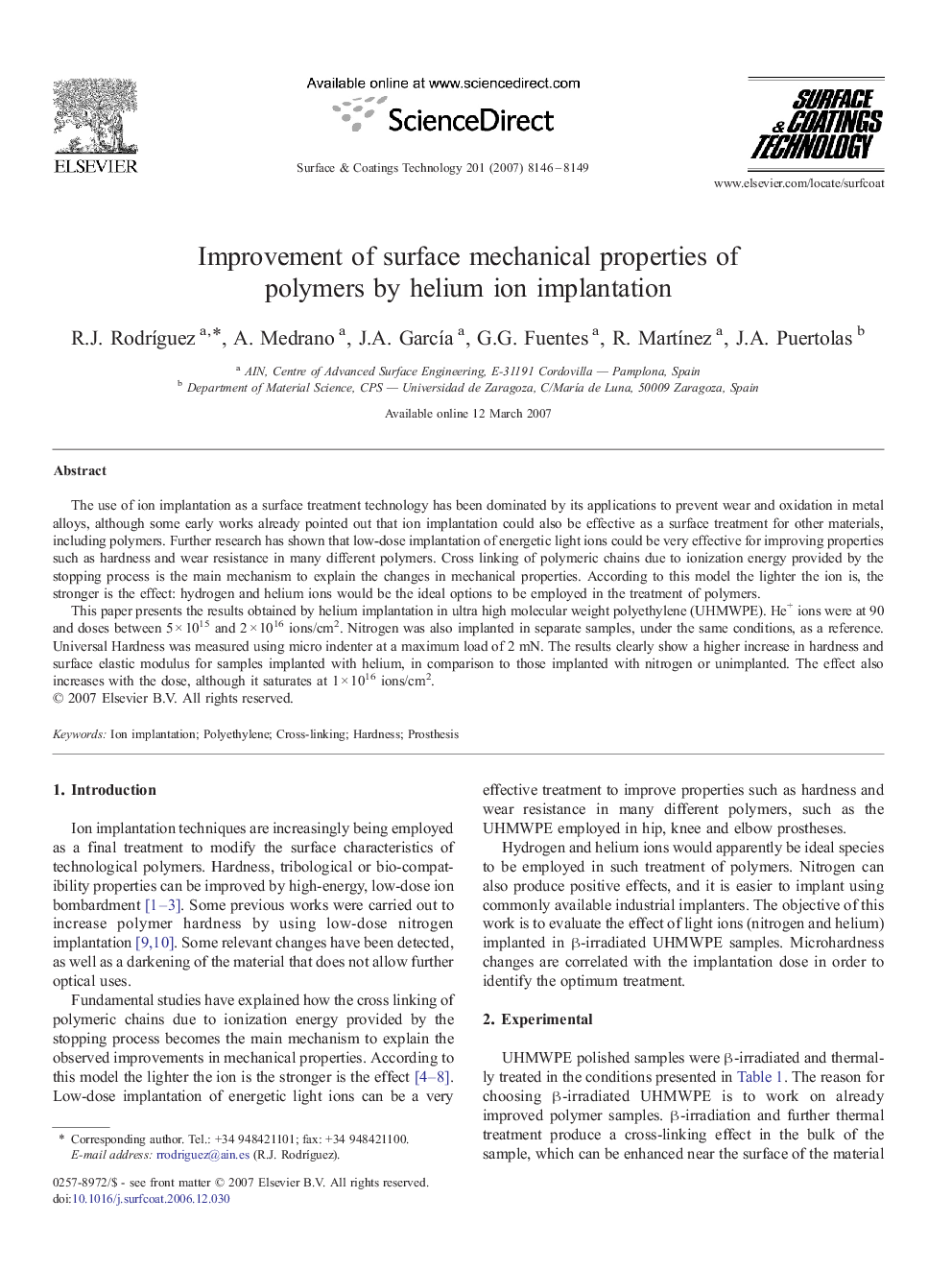 Improvement of surface mechanical properties of polymers by helium ion implantation