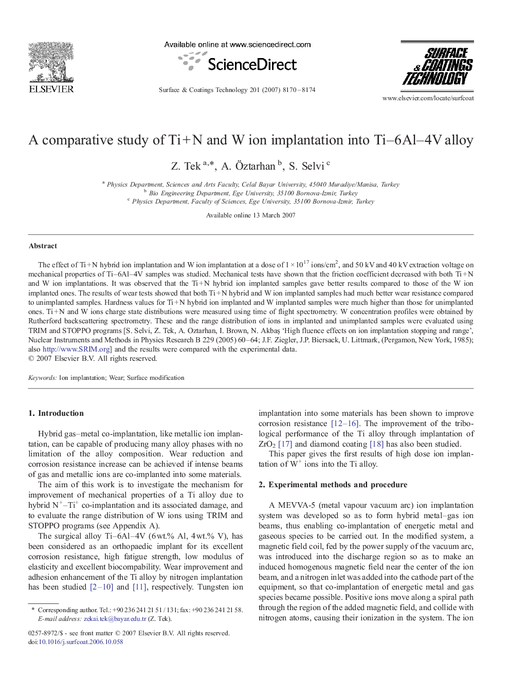 A comparative study of Ti + N and W ion implantation into Ti–6Al–4V alloy