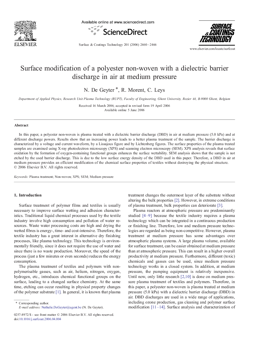 Surface modification of a polyester non-woven with a dielectric barrier discharge in air at medium pressure