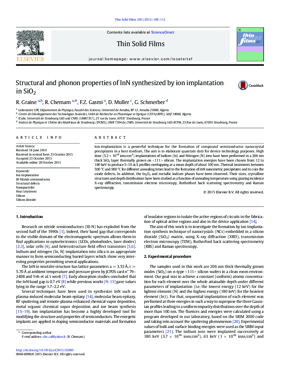 Structural and phonon properties of InN synthesized by ion implantation in SiO2