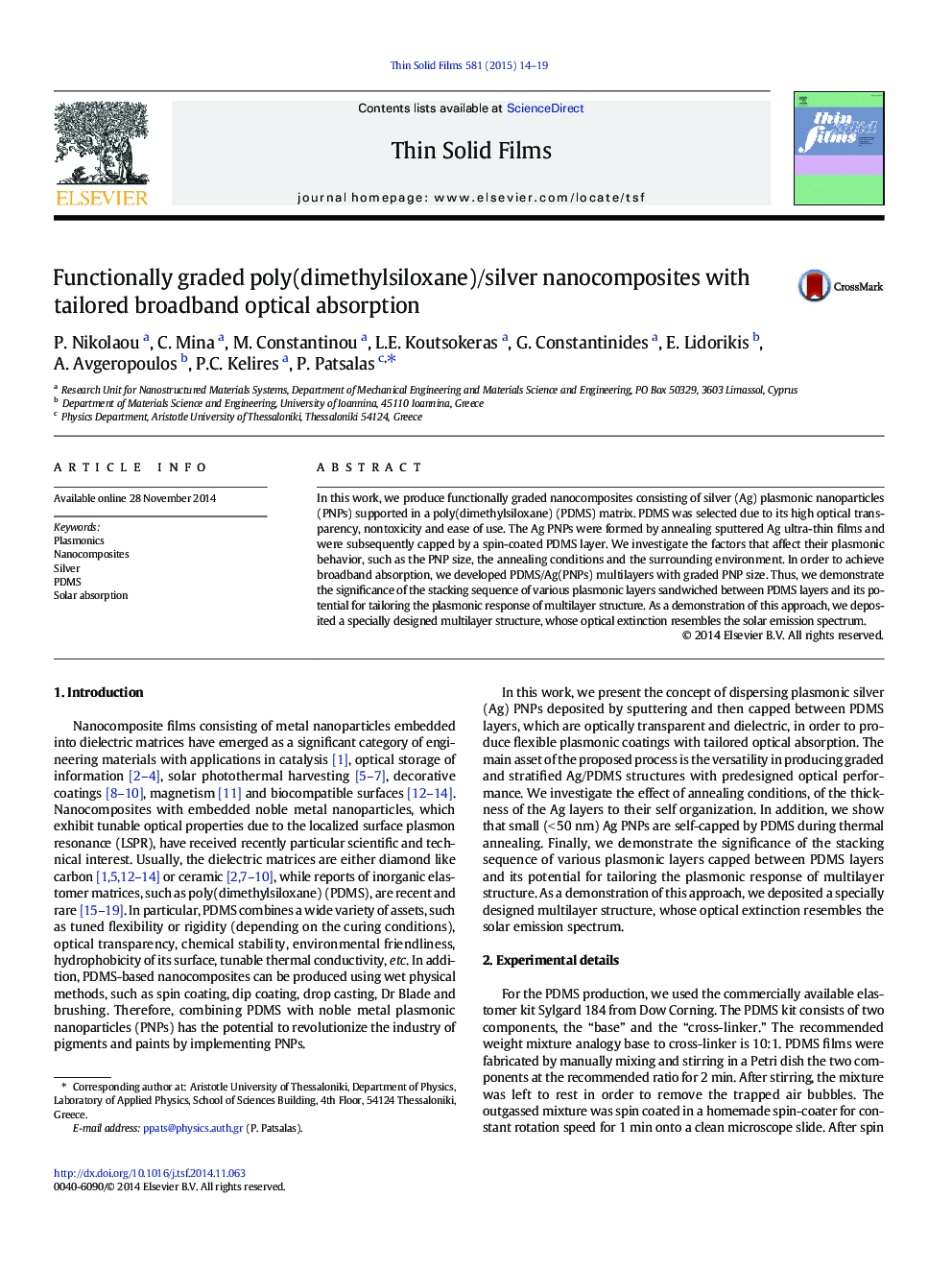 Functionally graded poly(dimethylsiloxane)/silver nanocomposites with tailored broadband optical absorption