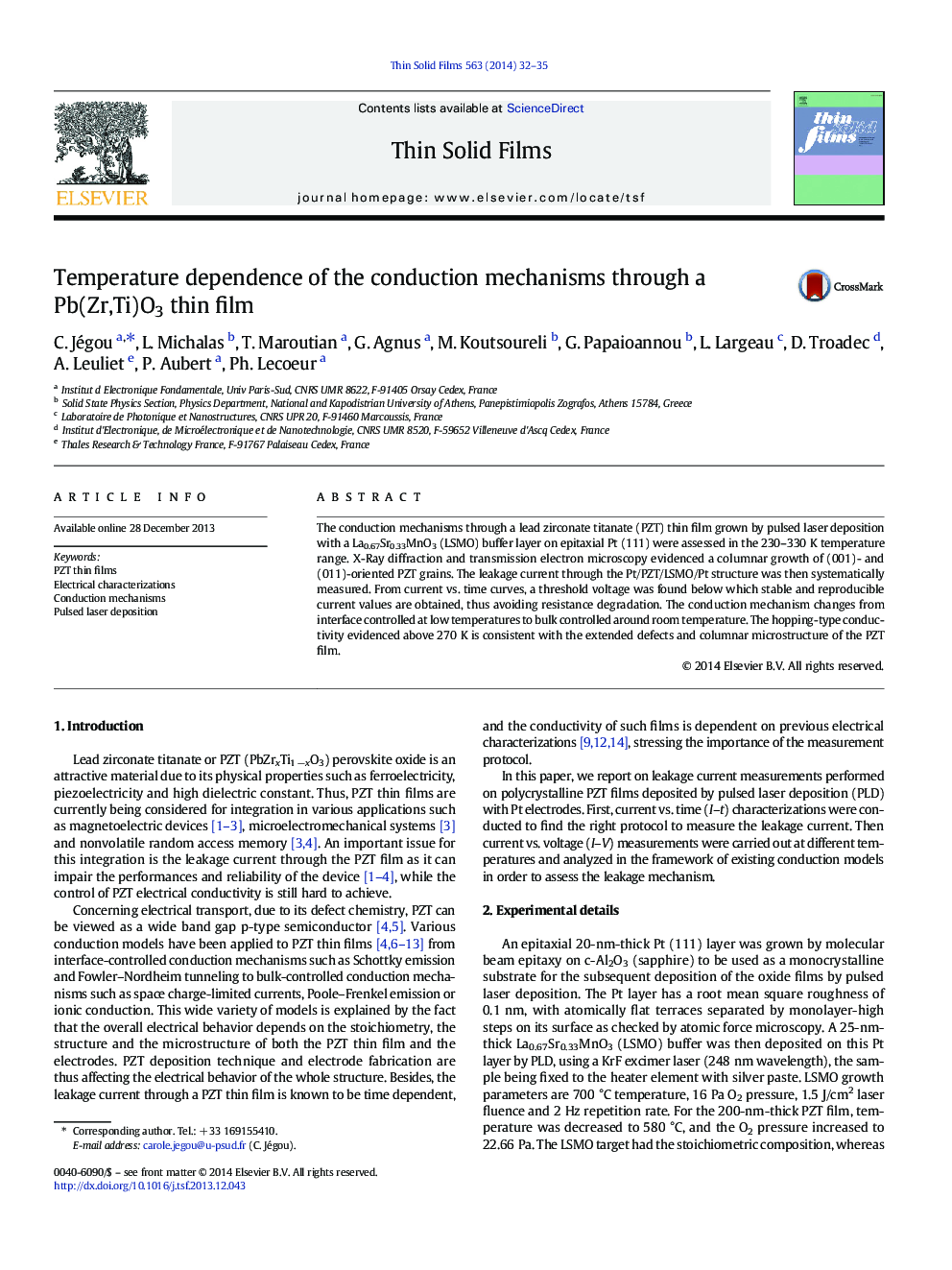 Temperature dependence of the conduction mechanisms through a Pb(Zr,Ti)O3 thin film