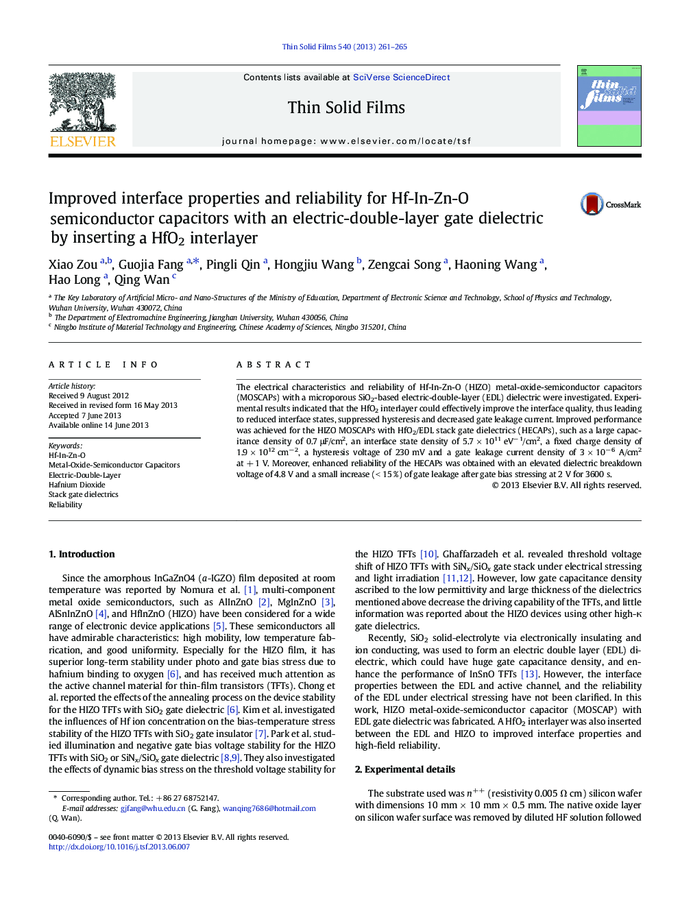 Improved interface properties and reliability for Hf-In-Zn-O semiconductor capacitors with an electric-double-layer gate dielectric by inserting a HfO2 interlayer