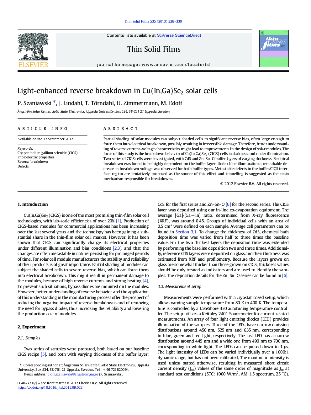 Light-enhanced reverse breakdown in Cu(In,Ga)Se2 solar cells