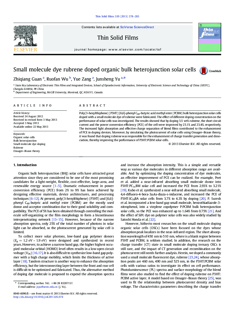 Small molecule dye rubrene doped organic bulk heterojunction solar cells