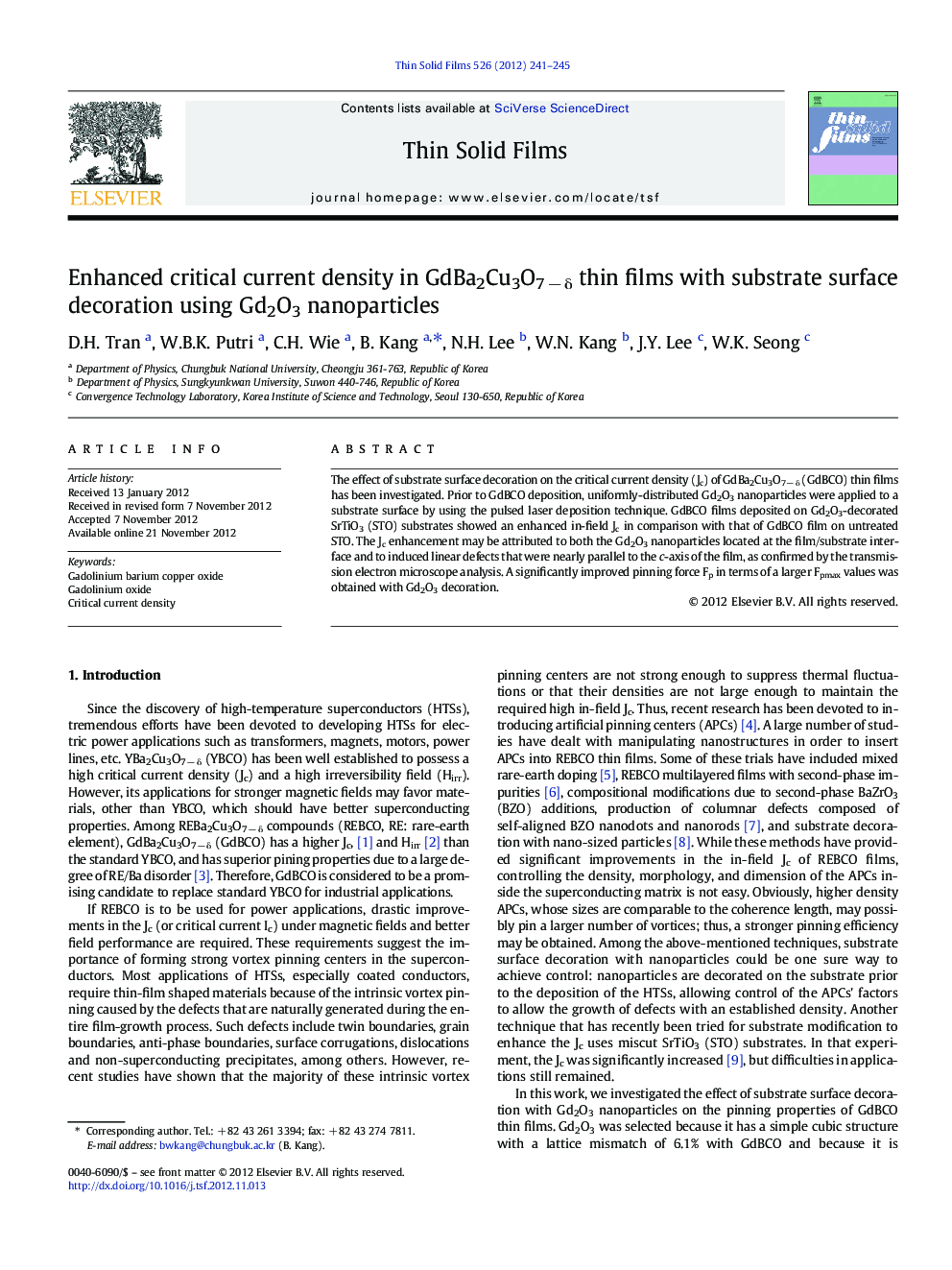 Enhanced critical current density in GdBa2Cu3O7 − δ thin films with substrate surface decoration using Gd2O3 nanoparticles