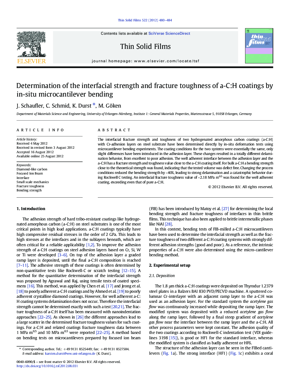 Determination of the interfacial strength and fracture toughness of a-C:H coatings by in-situ microcantilever bending