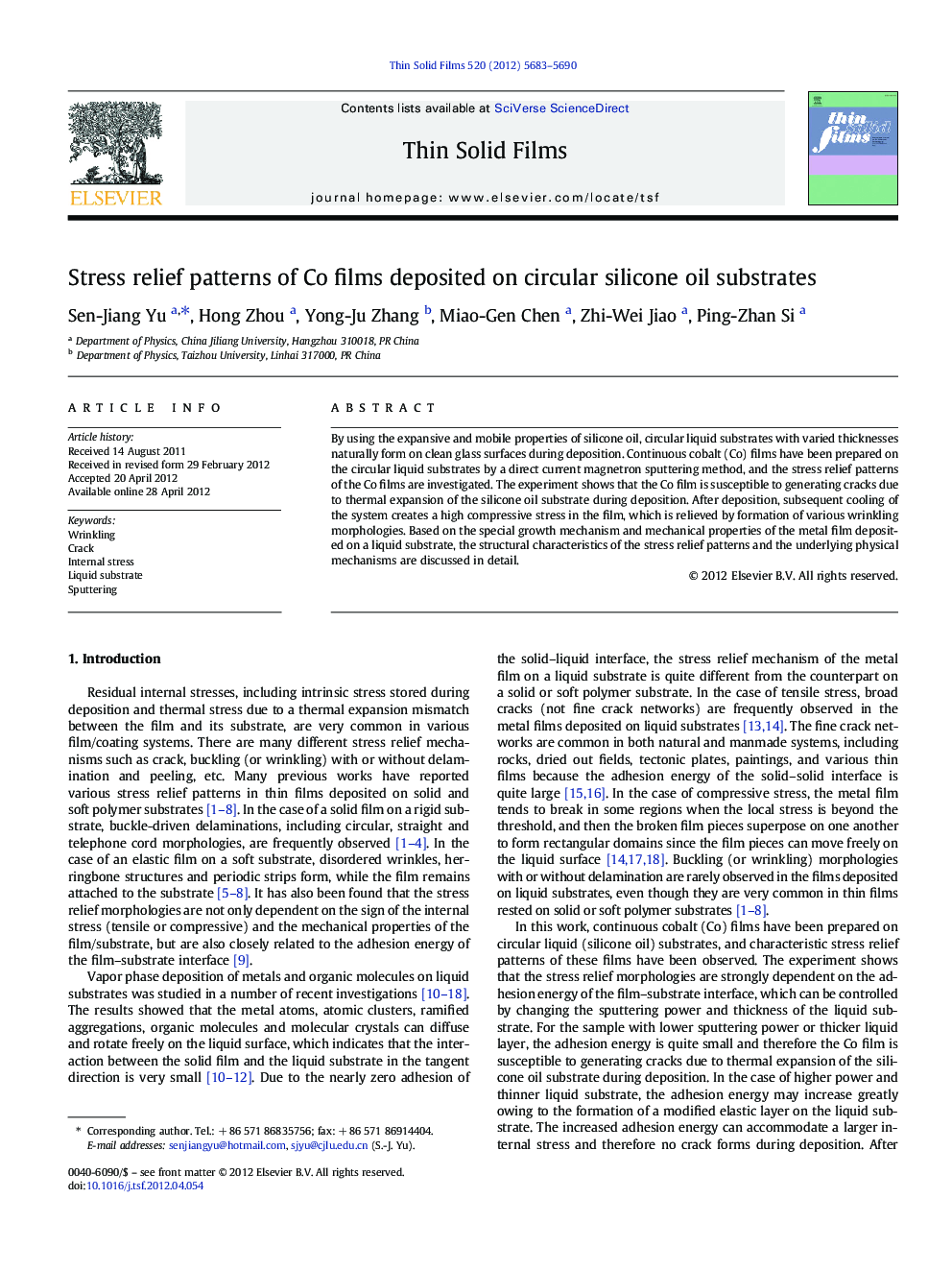 Stress relief patterns of Co films deposited on circular silicone oil substrates