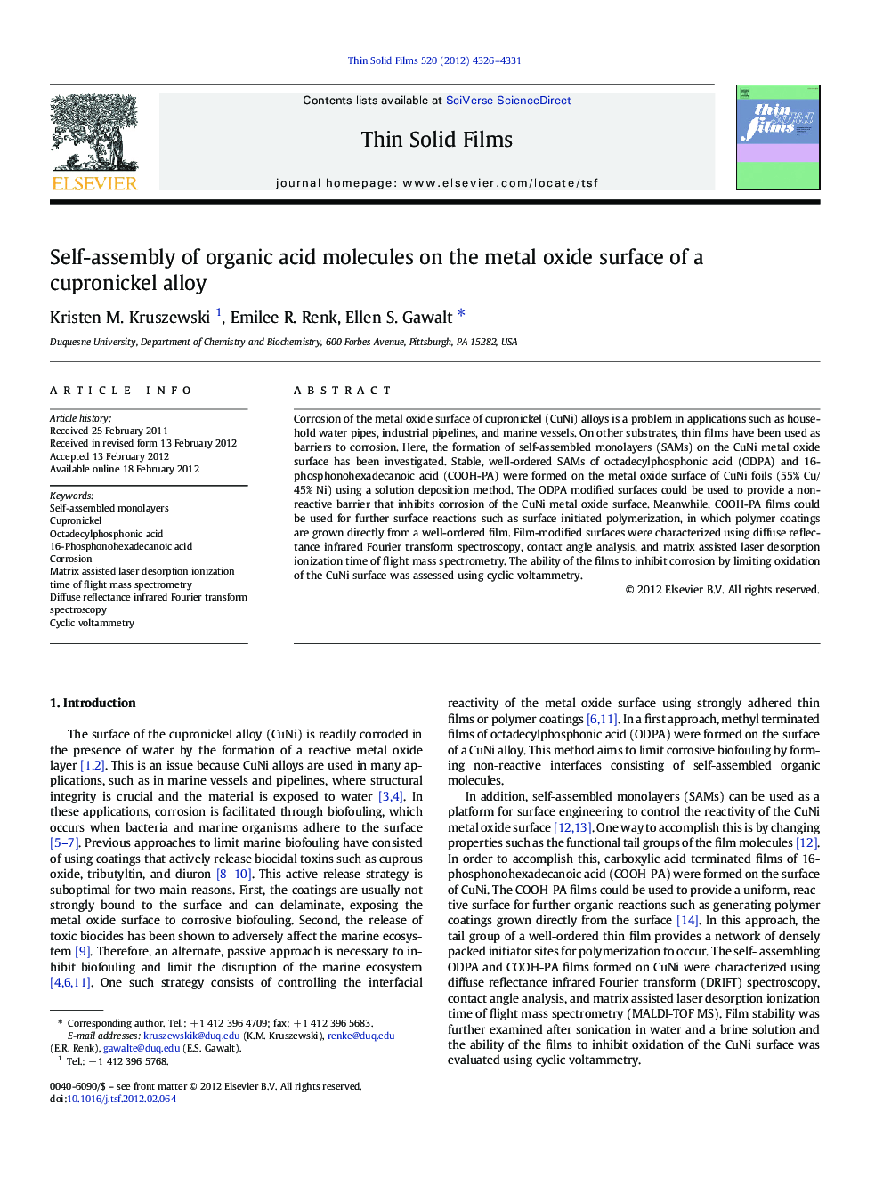 Self-assembly of organic acid molecules on the metal oxide surface of a cupronickel alloy