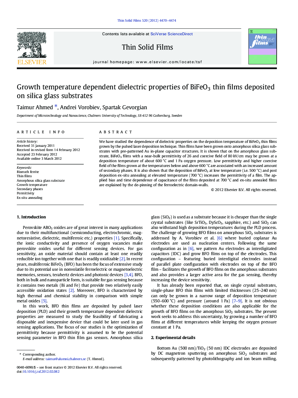 Growth temperature dependent dielectric properties of BiFeO3 thin films deposited on silica glass substrates