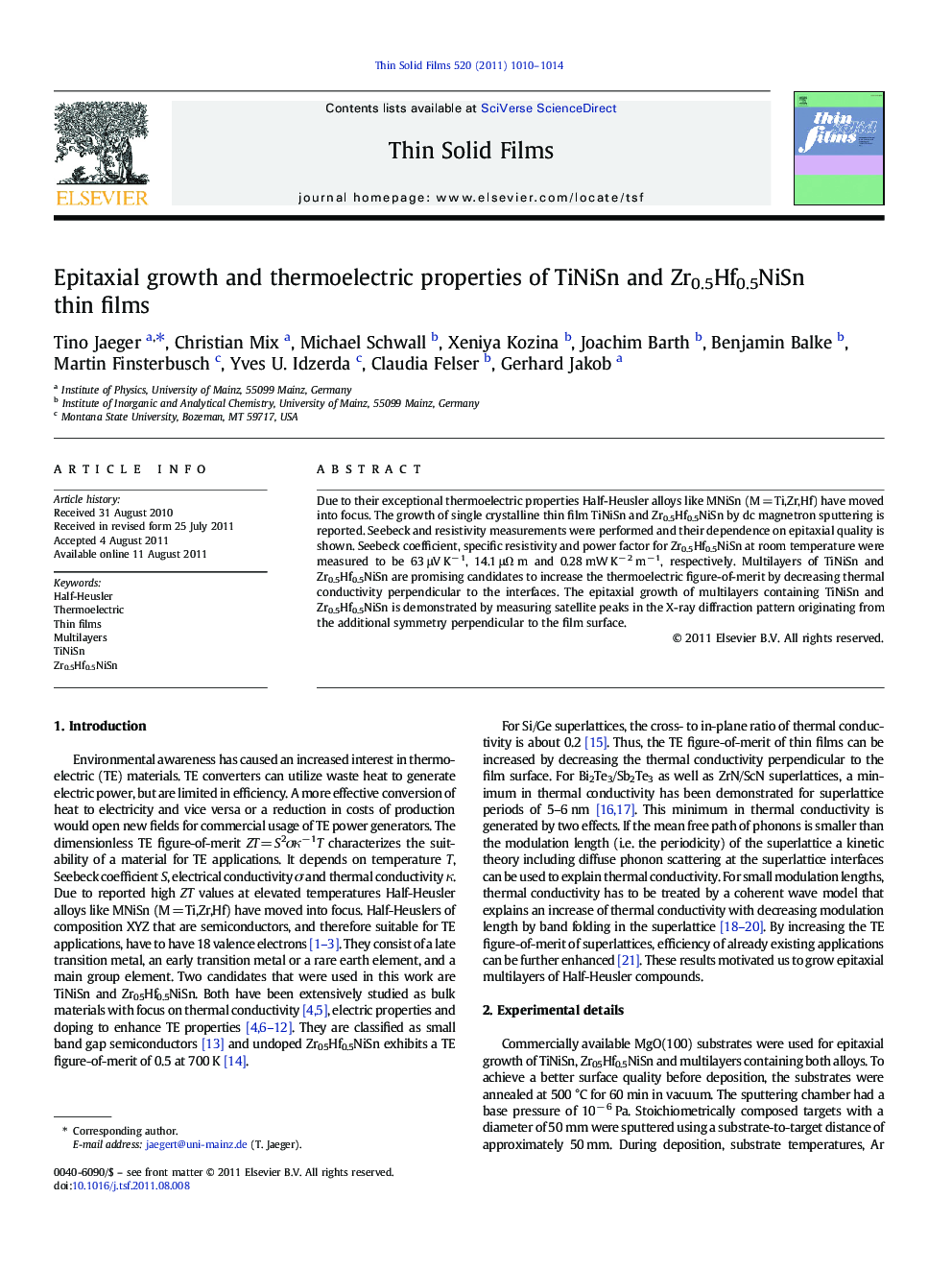 Epitaxial growth and thermoelectric properties of TiNiSn and Zr0.5Hf0.5NiSn thin films