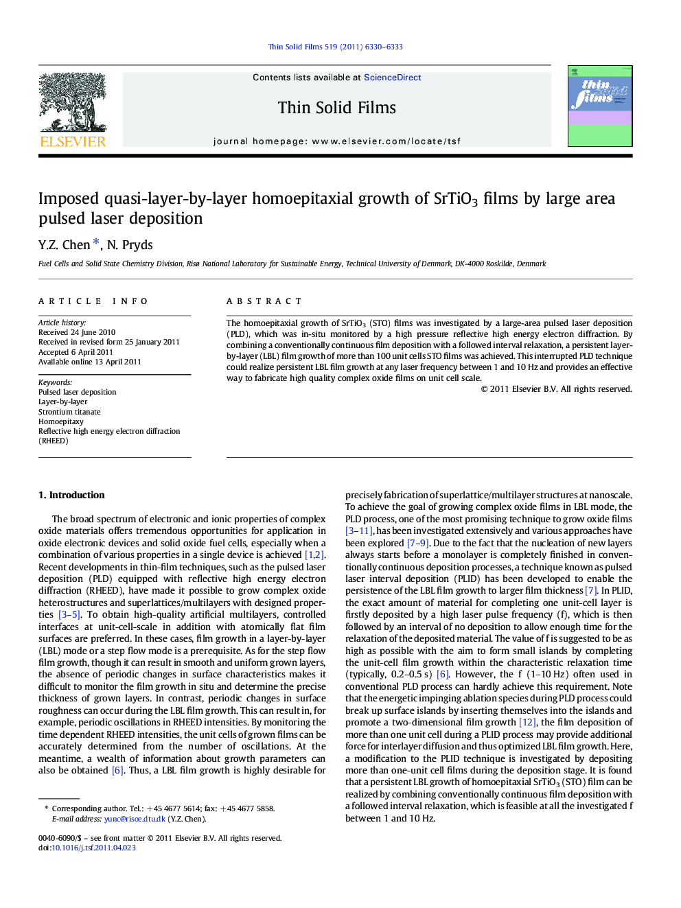 Imposed quasi-layer-by-layer homoepitaxial growth of SrTiO3 films by large area pulsed laser deposition