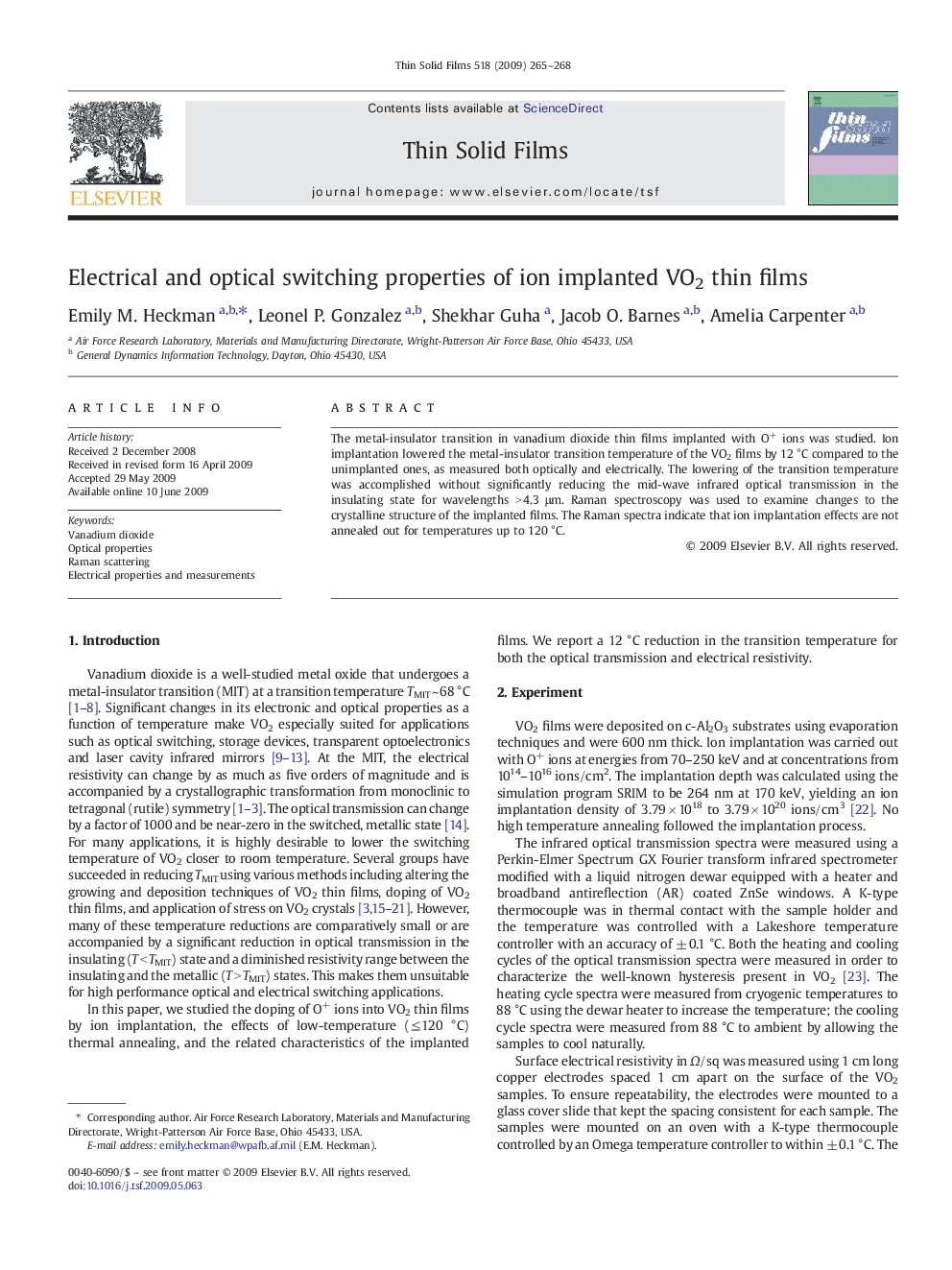 Electrical and optical switching properties of ion implanted VO2 thin films