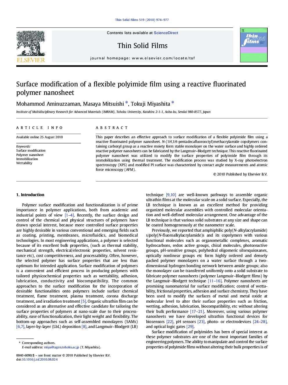 Surface modification of a flexible polyimide film using a reactive fluorinated polymer nanosheet