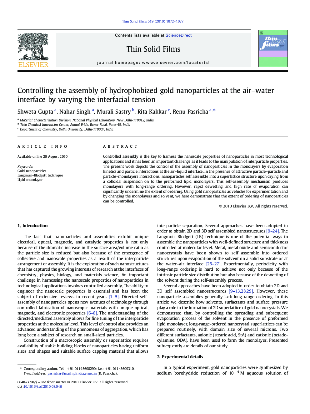 Controlling the assembly of hydrophobized gold nanoparticles at the air-water interface by varying the interfacial tension