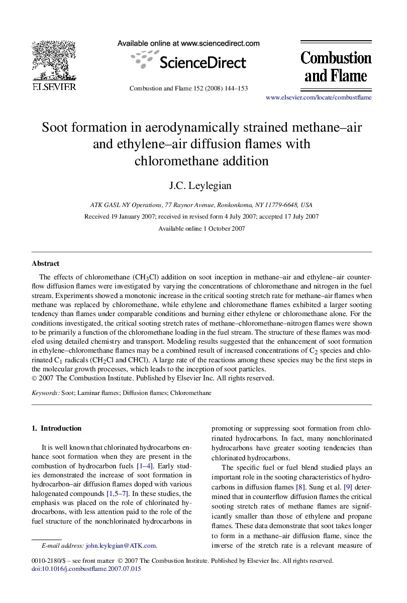 Soot formation in aerodynamically strained methane–air and ethylene–air diffusion flames with chloromethane addition