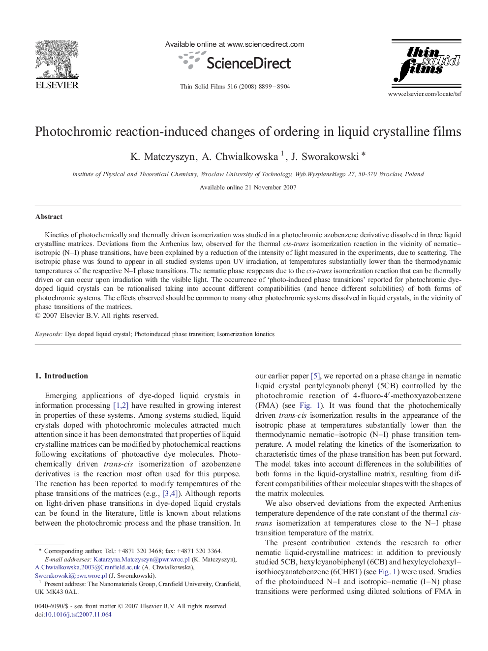 Photochromic reaction-induced changes of ordering in liquid crystalline films