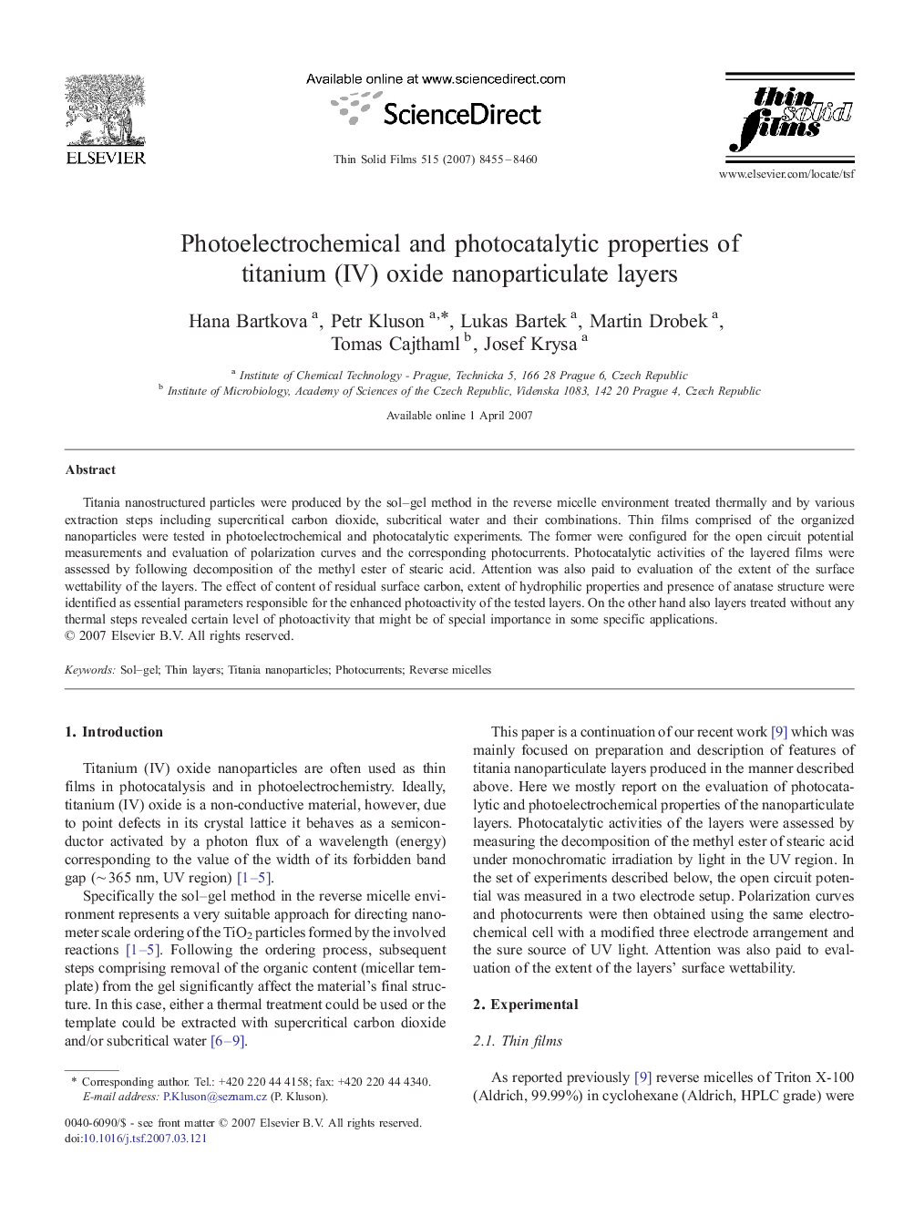 Photoelectrochemical and photocatalytic properties of titanium (IV) oxide nanoparticulate layers