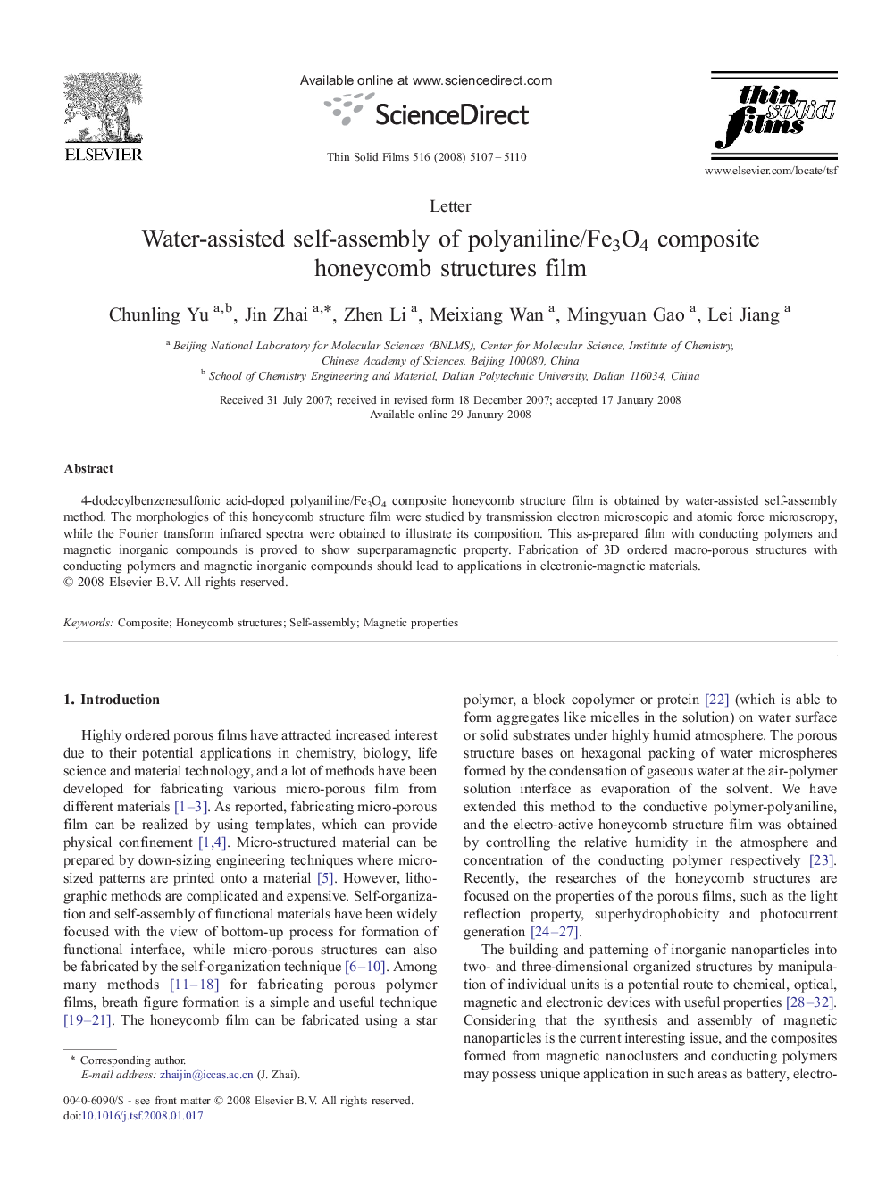 Water-assisted self-assembly of polyaniline/Fe3O4 composite honeycomb structures film