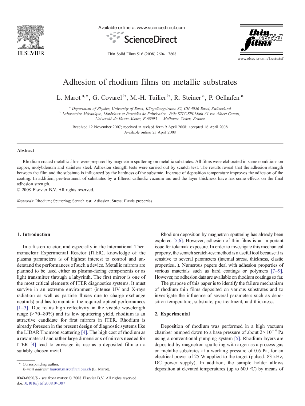 Adhesion of rhodium films on metallic substrates