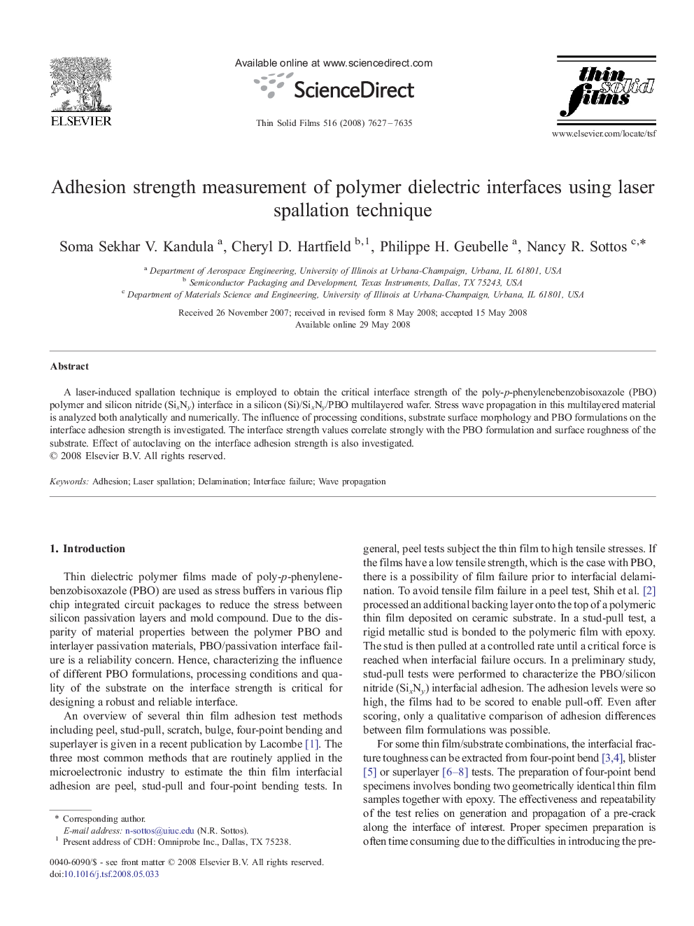 Adhesion strength measurement of polymer dielectric interfaces using laser spallation technique