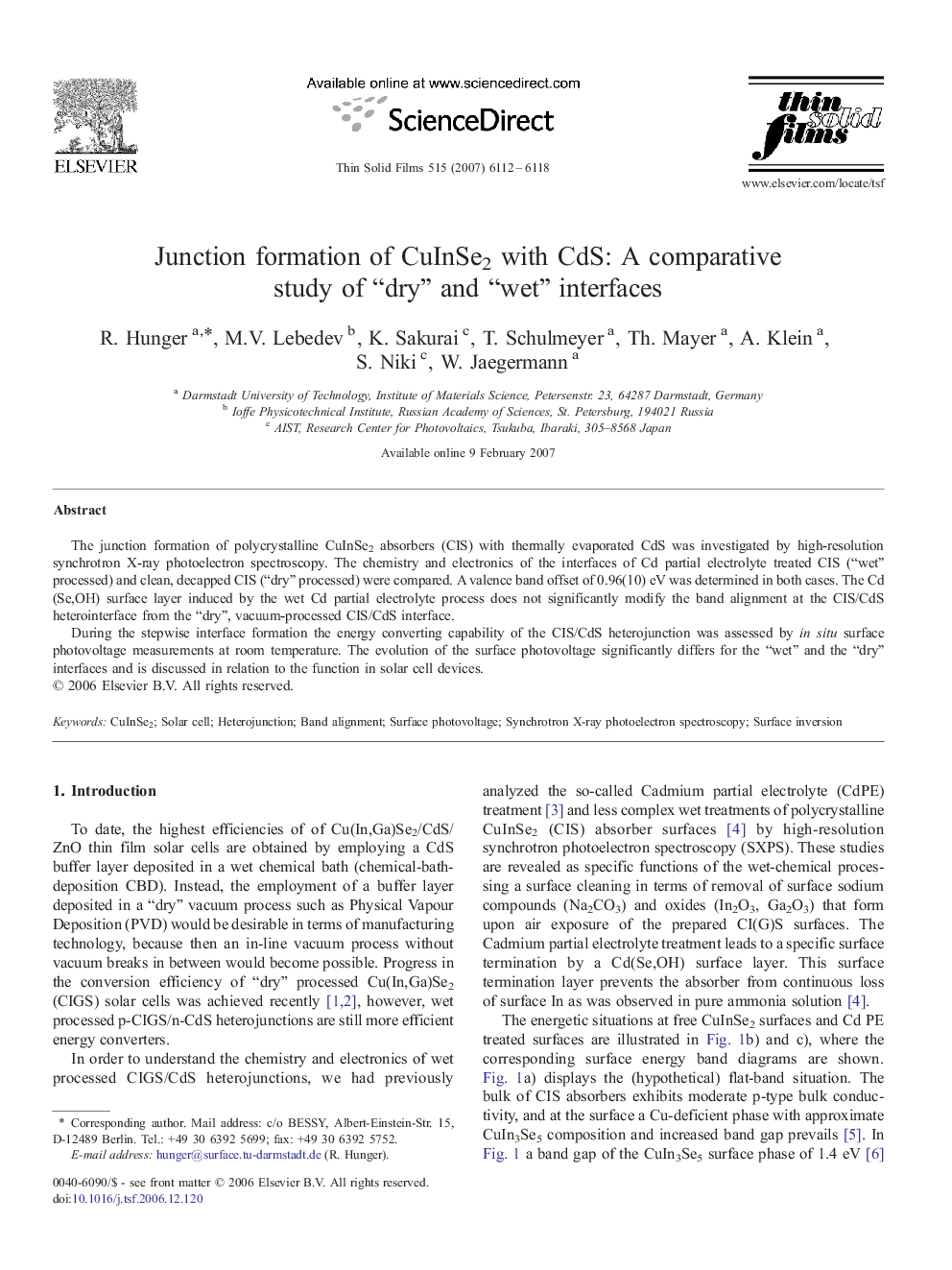 Junction formation of CuInSe2 with CdS: A comparative study of “dry” and “wet” interfaces