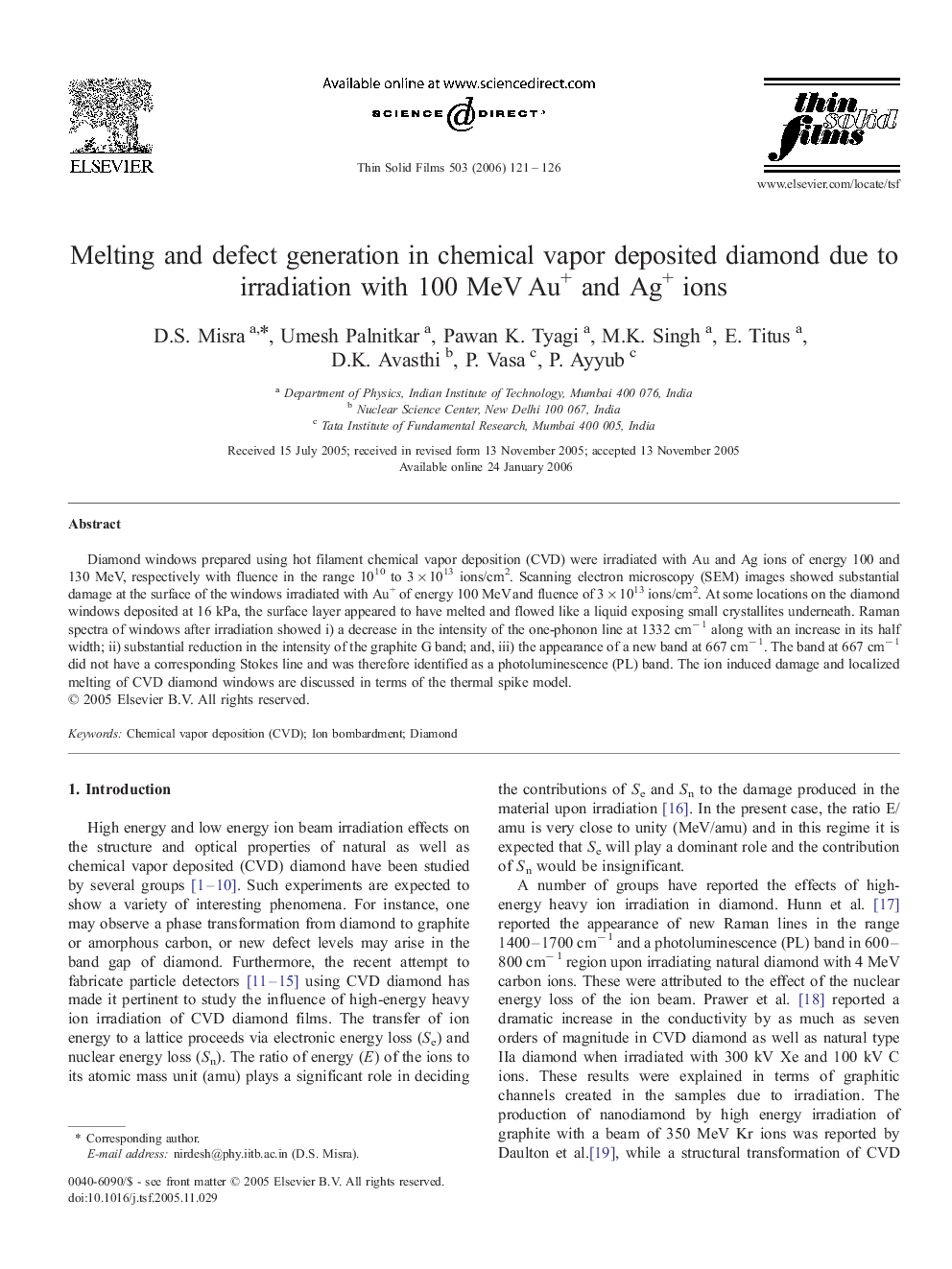 Melting and defect generation in chemical vapor deposited diamond due to irradiation with 100 MeV Au+ and Ag+ ions