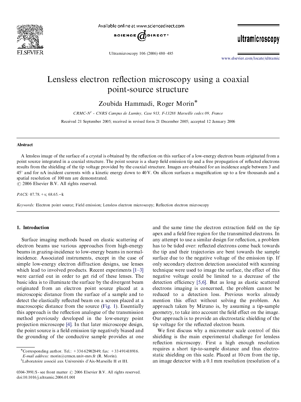 Lensless electron reflection microscopy using a coaxial point-source structure