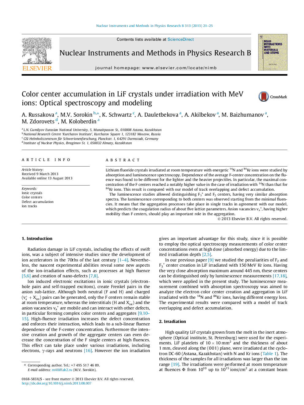 Color center accumulation in LiF crystals under irradiation with MeV ions: Optical spectroscopy and modeling