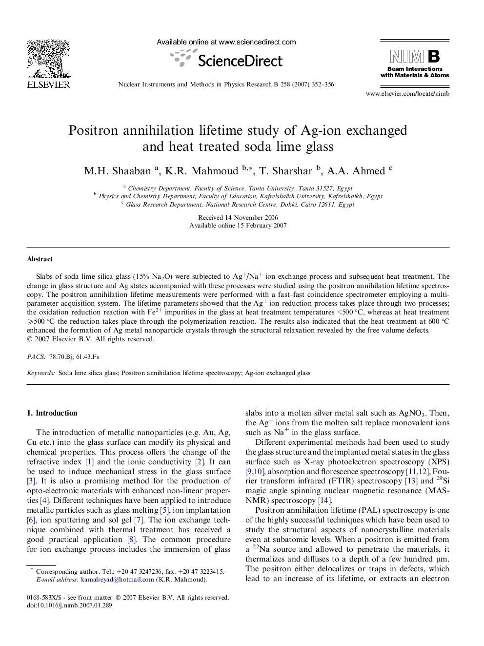 Positron annihilation lifetime study of Ag-ion exchanged and heat treated soda lime glass