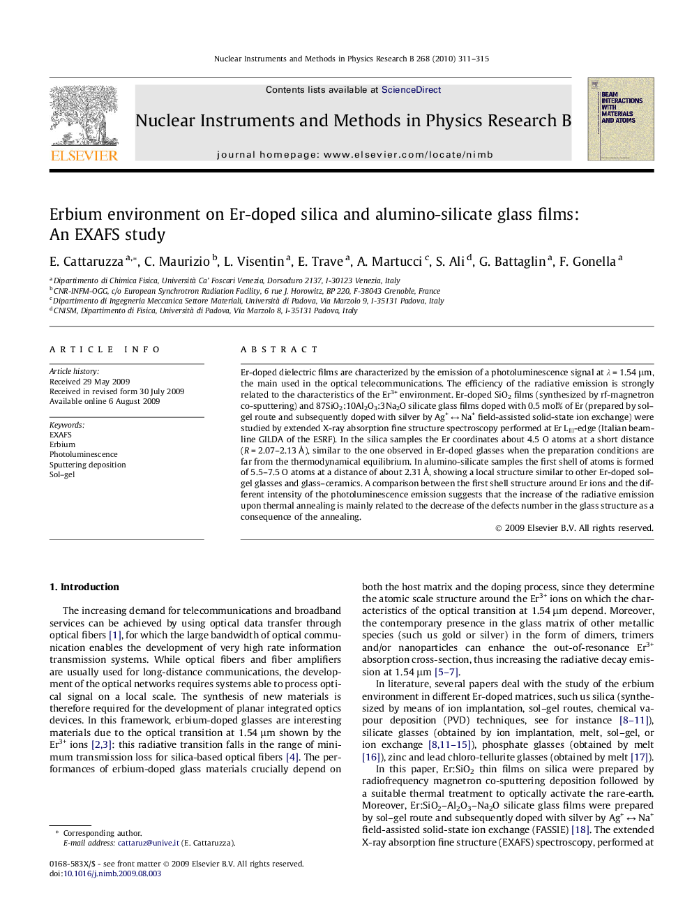 Erbium environment on Er-doped silica and alumino-silicate glass films: An EXAFS study