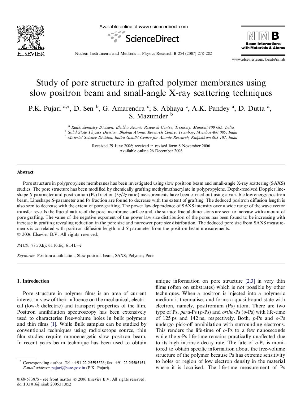 Study of pore structure in grafted polymer membranes using slow positron beam and small-angle X-ray scattering techniques