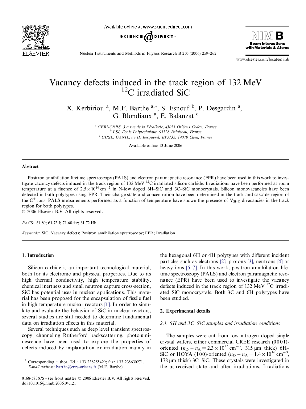 Vacancy defects induced in the track region of 132 MeV 12C irradiated SiC