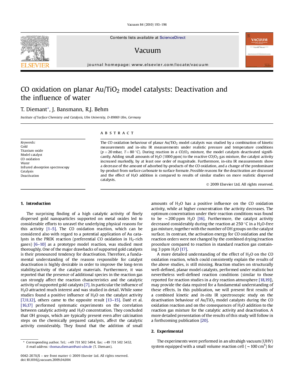 CO oxidation on planar Au/TiO2 model catalysts: Deactivation and the influence of water