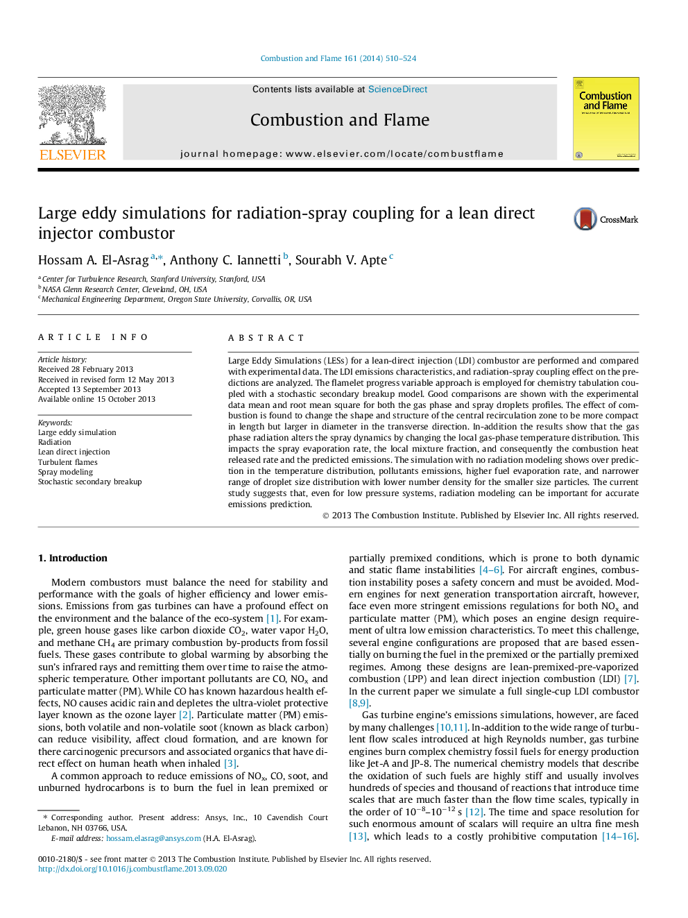 Large eddy simulations for radiation-spray coupling for a lean direct injector combustor