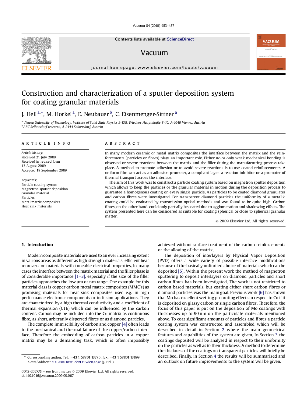 Construction and characterization of a sputter deposition system for coating granular materials