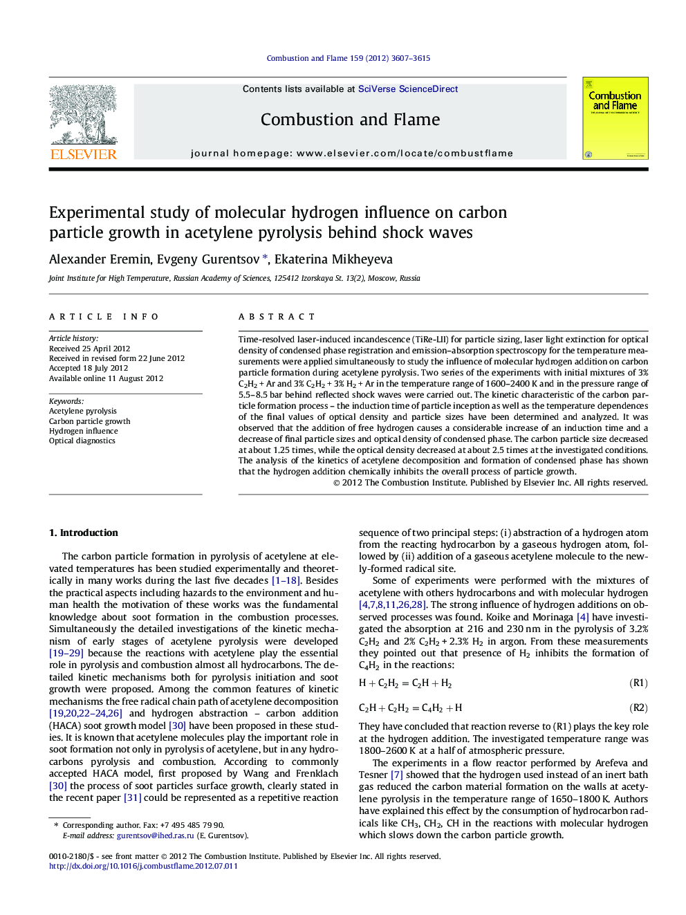 Experimental study of molecular hydrogen influence on carbon particle growth in acetylene pyrolysis behind shock waves